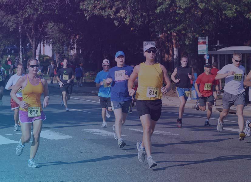 Image of runners participating in a 5K race event.